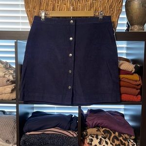 Old Navy corduroy blue skirt with snap buttons. Size 12.